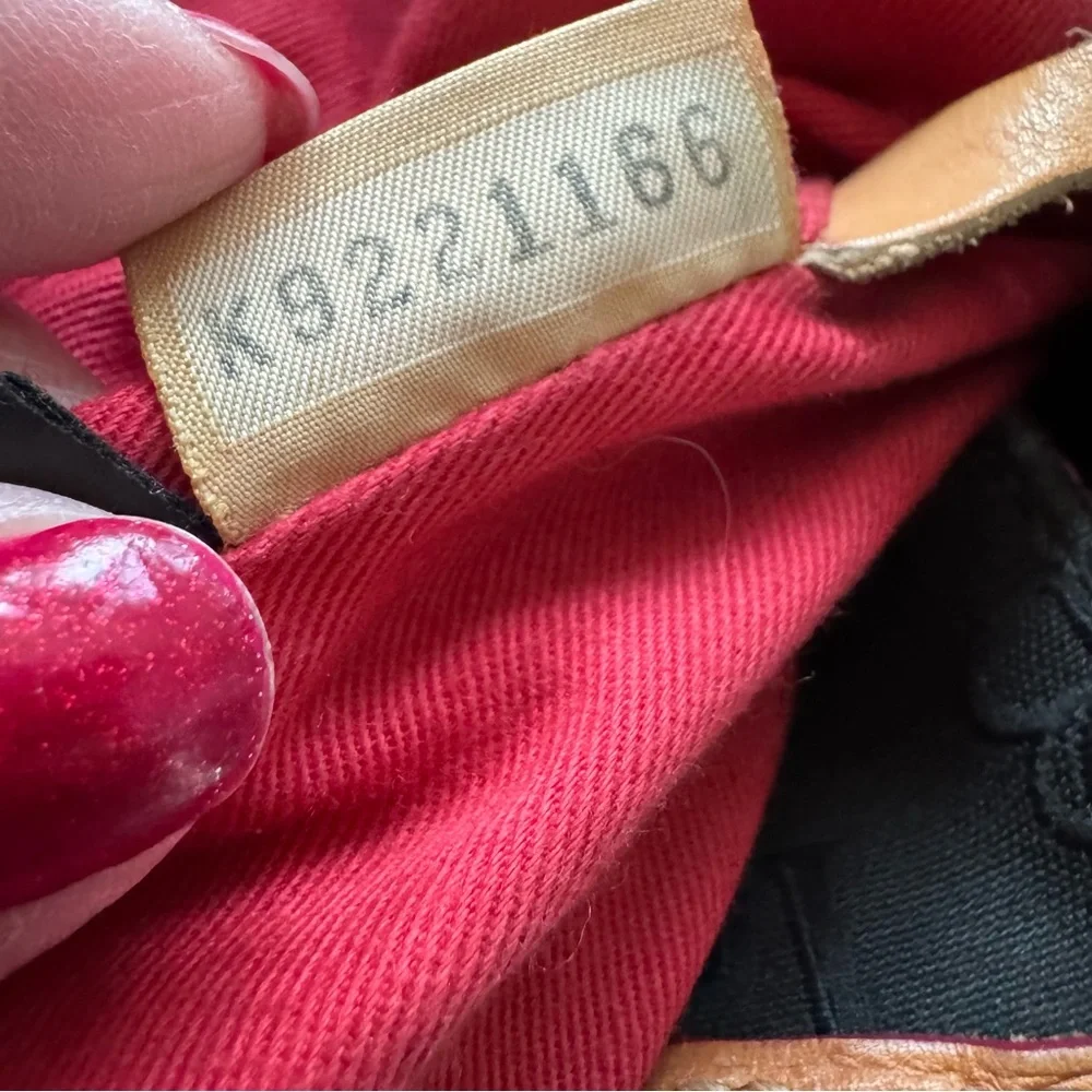 Dooney & Bourke black and tan‎ monogram Handbag hobo